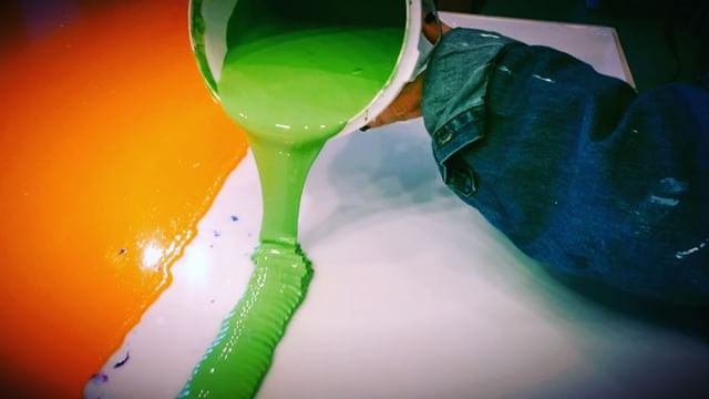In the studio: Lime green extravaganza! Day seven of pouring gallons of @goldenpaints gels and paint on every available flat surface! 4 to 5 days for these pours to dry and I'll finally have enough materials to get started on next painting . . . . .