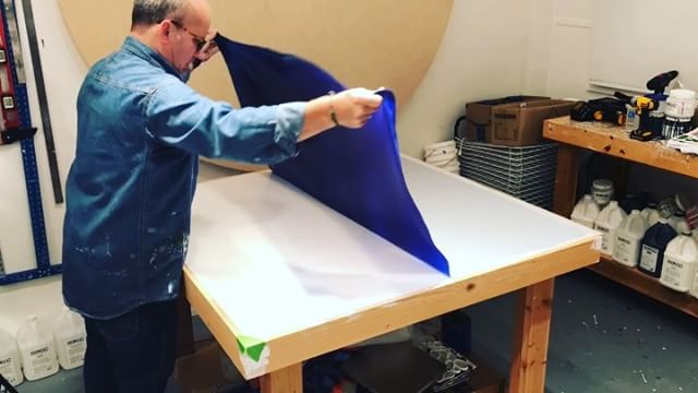 In the studio: Peel and roll day for one of the 7 colors being produced for new projects. This is the last of the luscious blue pieces with many more days of creating paint fabric to go. A long way until this material gets used in an artwork. Thanks for watching. Stay tuned. . . . .