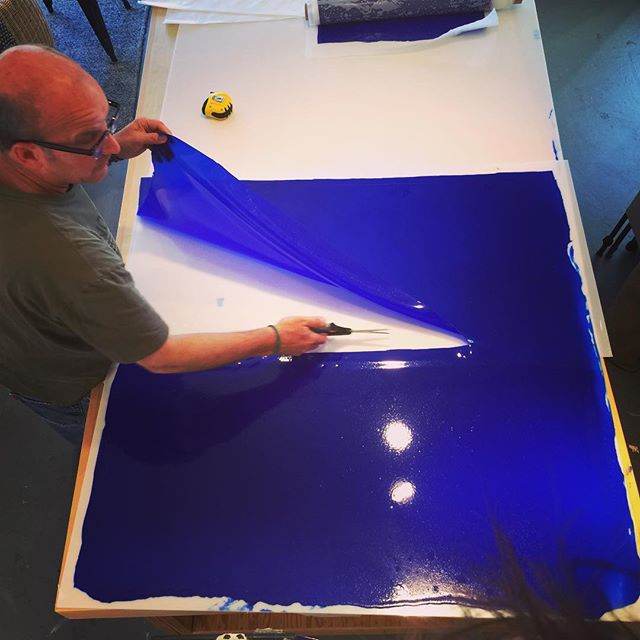 In the studio: cutting large sheets of acrylic gel into manageable size. It's been a week of beautiful shades of blue.