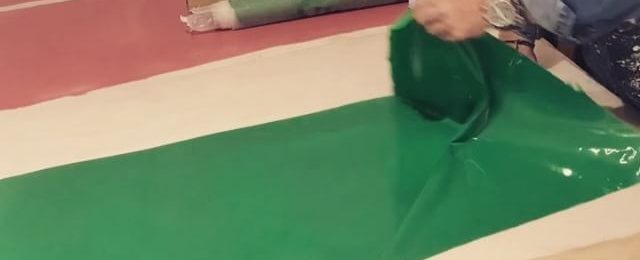 In the studio: Peeling and rolling two of the 8 colors being produced for new projects. This timelapse is the last of the green and pink pieces. There are a few more days of creating paint fabric until the material gets used in artwork. Thanks for watching. Stay tuned. . . .