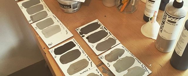 Looking for the perfect grey or gray. It’s color mix and compare day in the studio. So far not quite the desired shade. #paint #mixingpaint