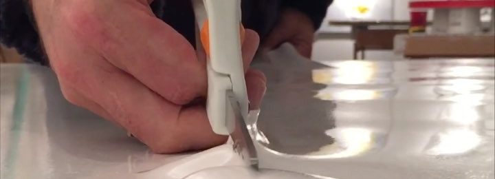 In the studio: Cutting up giant sheets of acrylic gel. Yep it's fun – like making paint fabric!