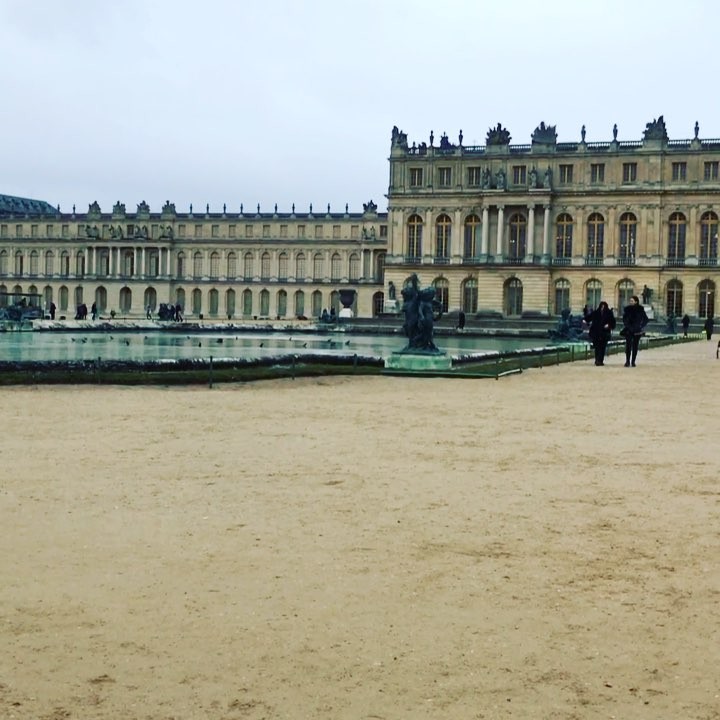 The back or garden facing part of  Versailles. A grey day at the @chateauversailles